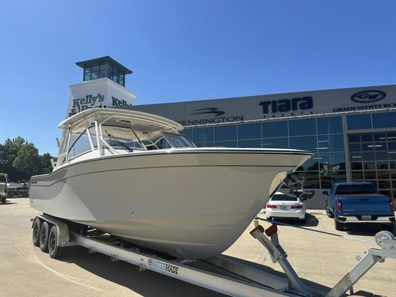Before: bow in front of the dealership